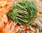 A picture of step 13 of Authentic Hakata-Style Soy Sauce Motsu Nabe at Home.