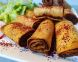 A picture of step 4 of Lahm Bi Ajeen Chicken Rolls.
