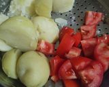 A picture of step 1 of Aloo rassa.
