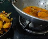 A picture of step 3 of Dhokla in gravy.