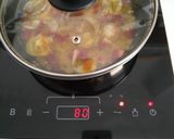 Foto del paso 3 de la receta Arroz con complementos en Placa de inducción (8 ingredientes)