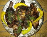 صورة لخطوة 4 من وصفة سمك مشوي ومحشي بالطماطم والخضره 😋