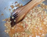 A picture of step 4 of 3 spice Daal Chana.