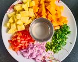 A picture of step 1 of Mango Pineapple Salsa.