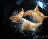 A picture of step 4 of Momo shaped badam stuffed dry ghujia.