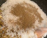 A picture of step 3 of Mdardara - brown lentils and rice with fried onions.