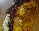 Foto del paso 13 de la receta: Entraña confitada con guarnición de papas, cebolla y morrón