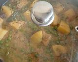 A picture of step 3 of Aloo, matar, polaw.