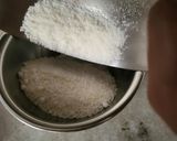 A picture of step 1 of HEALTHY FARADI DESSERT(Dessicated coconut).