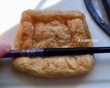 A picture of step 7 of Japanese Pork and Egg Tofu Pouches (Nikuman-Inspired).