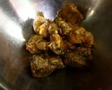 A picture of step 6 of Bhounwa kadu chicken.