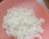 Gambar langkah 2 resipi Kek Nasi Kelapa.