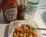A picture of step 7 of Chicken veggies macronies.