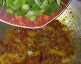 A picture of step 7 of Green Onions Potato Tomato Sabji.