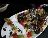 A picture of step 3 of Mix chocolate fruit salad.