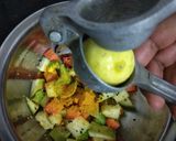 A picture of step 5 of Mix Spicy-Tangy Pickle.