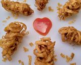 A picture of step 6 of Thread wrapped chicken strips.