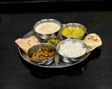 A picture of step 7 of Maharashtrian Thali For Lunch -Fry Bhindi, Bhhat,Varan, Kharda, Chapati, Kheer.