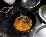 A picture of step 4 of Colacasia & green sorrel curry (alu chi bhaji).