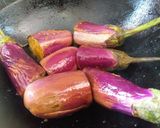 A picture of step 2 of Baingan Ki Kalonji (Stuffed Eggplant with Spices).