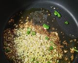 A picture of step 2 of Lahsuni chilli bhindi.