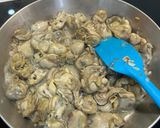 A picture of step 2 of Oyster and Straw Mushroom Brown Rice Porridge.