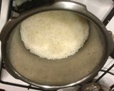 A picture of step 1 of Coconut milk rice.