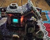 Foto del paso 13 de la receta: Mi casita de jengibre, chocolate y glasé!!🏠🎄🎄🎇