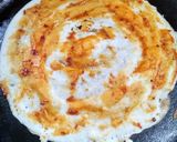 A picture of step 3 of Shezwan masala cheese Dosa roll.