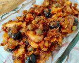 Foto del paso 4 de la receta: Sofrito de pulpo con aceitunas negras y alcaparras