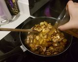 A picture of step 6 of Potato, mushroom and coconut curry pot & coriander tortilla.