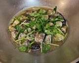 A picture of step 4 of Clam with Patola.