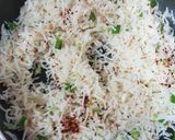 A picture of step 3 of Burnt chilli garlic rice with baked beans gravy.