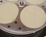 A picture of step 5 of Oats Carrot Idli.