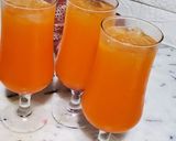 A picture of step 2 of Mango Orange Blast mocktail.
