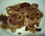 A picture of step 5 of Toast withcaramelized onions,pizoila sauce and brawn.#kidsrecipe.