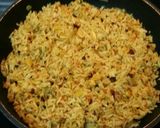 Foto del paso 3 de la receta Arroz basmati al curry con pasas, zanahorias y almendras