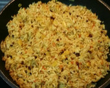 Foto del paso 3 de la receta: Arroz basmati al curry con pasas, zanahorias y almendras