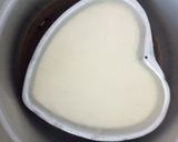 A picture of step 2 of Chhena poda.