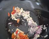 Foto langkah ke 2 dari resep 262. Tumis Timun Teri Kemangi.