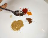 A picture of step 1 of Beguni ghoti gorom.