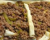 Foto del paso 6 de la receta: Pizza-Hojaldre de Carne Picada y Pimiento Verde