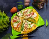 A picture of step 1 of Veg pizza / ONION tomato CAPSICUM PIZZA.