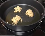 A picture of step 2 of Sautéed garlic spinach.