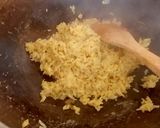 A picture of step 3 of My Egg fried Rice with the malaysian curry sauce.