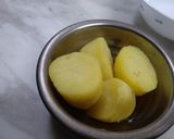 A picture of step 1 of Aloo Chokha.