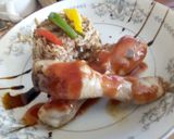 A picture of step 7 of Chinese Stir fried Rice with stewed drumsticks.