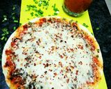 A picture of step 7 of Cheese Uttapam pizza style.