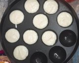 A picture of step 4 of Mini Gulab Jamun Cake in Appe Pan.