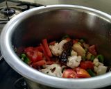 A picture of step 4 of Navratna Shahijahani Khichdi.